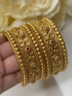 #luxury #bhfyp #jewelry #stylish #onlineshopping #gold #smallbusiness #accessories #trendy #etsy #earrings #jewellery #necklace #silver #handmadejewelry #bracelet #ring #crystals #diamond Indian Kada Designs, Gold Jadau Bangles, Big Bangles Gold, Heavy Gold Bangles, Kada Bangles Gold Design, Gold Kada Design For Women, Gold Antique Bangles