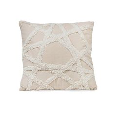 a white pillow with an intricate design on the front and back, sitting on a white background