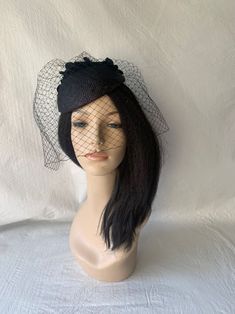 "Absolutely beautiful, this vintage inspired black Flower Fascinator hat with veil is perfectly suited for a wedding, tea party, church fascinator, formal high tea, mother of the bride headpiece, Kentucky Derby hat or any other special occasion. EASY TO WEAR Firmly secured underneath with alligator clip or elastic band to hold in place and to give you the versatility to wear it any desire you like. You can style your hair like a bun or you can place it further towards your face and wear it as a Black Hat Veil, Black Cloche Fascinator For Party, Veiled Hats Black, Black Vintage Fascinator, Vintage Black Hat Headpiece, Black Fascinator, Flower Fascinator, Bride Headpiece, Tea Party Hats