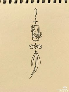 a drawing of a clock hanging from a string