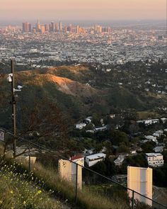 a view of the city from atop a hill