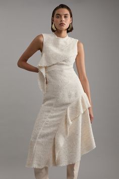 Elevate Your Evening Wardrobe With Our Asymmetric Dress, Made With Boucle, Flecked With Shimmering, Metallic Details. The Flared, Ruffled Skirt Brings The Drama While The Frayed Hemline Adds An Edge. Style It With Strappy Heels For An Occasion Look That Is Guaranteed To Turn Heads Wherever You Step. Metallic Boucle Tailored Sleeveless Asymmetric Midaxi Dress High Quality, Textured Boucle Fabric Subtle Metallic Detailing Flared, Asymmetric Skirt Fit And Flare Silhouette Edgy, Frayed Hemlines Zip Asymmetric Skirt, Asymmetric Dress, Midaxi Dress, Ruffled Skirt, Boucle Fabric, Smart Casual Outfit, Trending Sunglasses, Skirt Fits, Asymmetrical Skirt