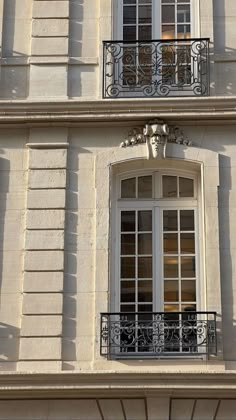 an ornate balcony and balconies on the side of a building