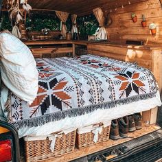 a bed in the back of a pick up truck