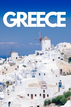 the cover of greece with white buildings and windmills