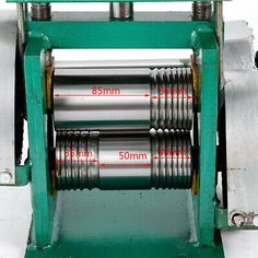 an image of a machine that is working on some kind of wire stripping machine