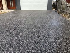 An image of Polished concrete driveway Aggregate Patio, Exposed Aggregate Driveway, Aggregate Driveway, Stamped Concrete Driveway, Exposed Aggregate Concrete, Stencil Concrete, Driveway Installation, Aggregate Concrete, Exposed Aggregate