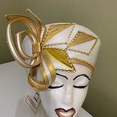 Nwt White With Beautiful Gold Trim & Sequins. White Chic Spring Fascinator, White Fitted Fascinator For Royal Ascot, White Chic Fascinator For Spring, Chic White Spring Fascinator, Chic White Fascinator For Spring, White Elegant Spring Hats, Elegant White Hats For Spring, Chic Fitted White Hat, Chic White Fitted Hat