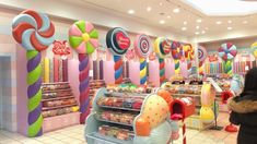 the interior of a candy shop with lots of colorful candies and lollipops