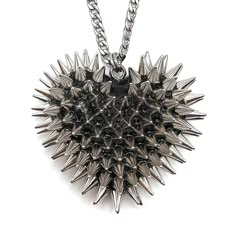 Meet your new favorite statement piece. The Spiked Heart Necklace is a Bunny Paige classic that’s the perfect edgy statement necklace. This full-size iconic handcrafted resin heart has over 100 individually hand-applied spikes in your choice of silver or gold. A bestselling, Bunny Paige classic. DETAILS Heart Charm: 2" wide Chain: stainless steel or gold plated SIZE CHART Punk Jewelry With Spikes, Adjustable Punk Spiked Jewelry, Spikey Choker Necklace, 31 Birthday, Spike Chain Necklace, Spike Necklace Punk, 90s Punk, Spiked Jewelry, Goth Accessories