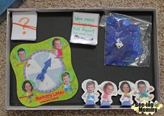 an open box with magnets and pictures on it