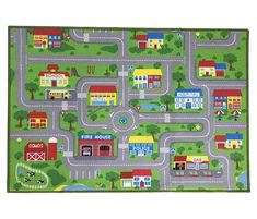 a child's play mat with cars, trucks and houses on the road in green