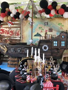 a pirate themed birthday party with balloons and decorations