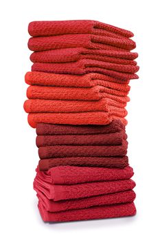 a stack of red towels sitting on top of each other