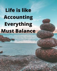 rocks stacked on top of each other with the words life is like accounting everything must balance