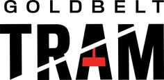 the gold belt tram logo is shown in black and white, with a red handle