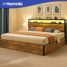 a bedroom with a bed, nightstands and pictures on the wall above it that says hommia