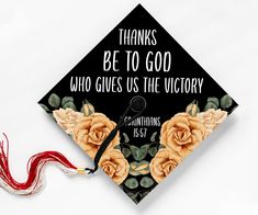 a graduation cap with flowers on it and the words, thanks be to god who gives us the victory