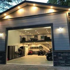 an open garage door with lights on it