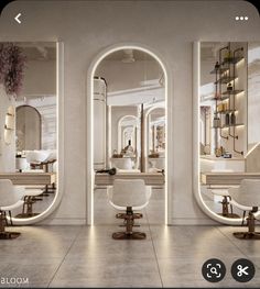 the interior of a salon with mirrors and chairs