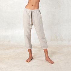 Very soft and comfortable relax fit lounge pants made of 100% medium-light weight linen. Front pockets, elastic waistband with wide strap closing. Can be worn high waisted or low waist. UnisexMade of 100% linen---------------Chantal, the model is 5'9" tallHer measurements are:bust: 33 inwaist: 25 inhips: 35 ininseem: 33.5 inch---------------Sizing Chart:O/S***Fit XSMALL (0 - 2) to LARGE (12 - 14)Linen pants ~ Lounge pants ~ Linen ~ Women pants ~ Summer pants ~ Black linen Pants Neutral Linen Beach Bottoms, Relaxed Straight Leg Pants For Relaxation, Comfortable Loose Fit Linen Harem Pants, Linen Harem Pants For Loungewear, Neutral Linen Pants With Elastic Waistband, Summer Straight Pants For Relaxation, Straight Pants For Summer Relaxation, Comfortable Summer Pants For Everyday, Comfortable Everyday Summer Pants