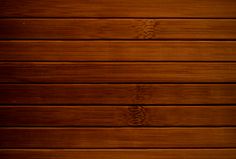 a close up view of wood planks on a wall