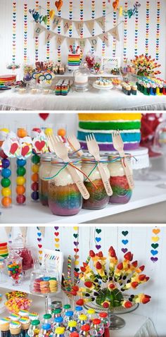 the dessert table is full of candy and candies, including rainbow - colored lollipops