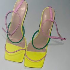 Fashionova Women’s Heels Size 10. Yellow Pink And Green. They Have Only Been Tried On Never Worn Green Heels With Contrasting Heel Counter For Spring, Spring Green Heels With Contrasting Heel Counter, Lime Green Heels For Spring Party, Yellow Heels With Padded Block Heel, Yellow Block Heels With Padded Heel, Yellow Pointed Toe Sandals For Spring, Yellow Heels With 4-inch Heel For Spring, Trendy Yellow Heels With Heel Strap, Spring Yellow Heels With 4-inch Heel