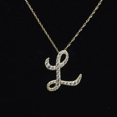 Very Nice Cursive Letter "L" 14k Gold Pendant Set With Round Cut Clear Cubic Zirconia On A 14k Gold Chain Necklace. 3/4" X 3/4" & 1.15g - Pendant 18" & .74g - Chain L Pendant Necklace, Bored Vision, Letter L Necklace, Quince Jewelry, Cursive L, L Necklace, Gold Pendant Set, Gold Initial Pendant, Initial Design