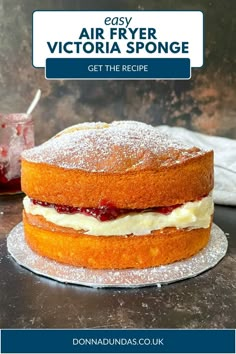 a cake on a plate with the words easy air fryer victoria sponge get the recipe