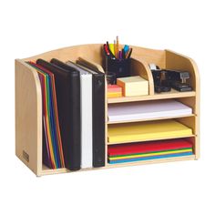 a wooden desk organizer with books, binders and folders on top of it