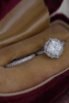 an engagement ring in a velvet box