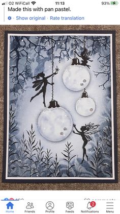 a christmas card with tinkerbells hanging from the ceiling and snow globes