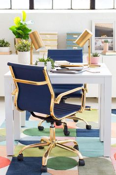 an office chair sitting on top of a colorful rug