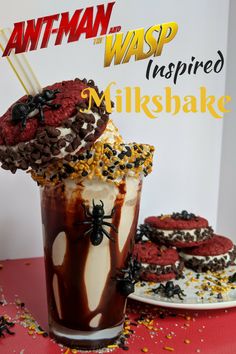 an ice cream milkshake with chocolate sprinkles and spider web decorations