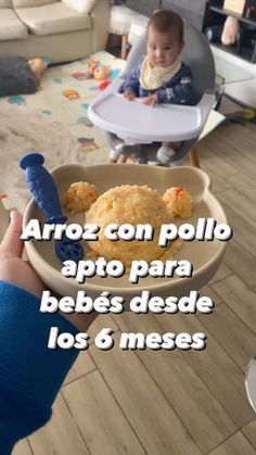 a baby sitting in a highchair eating food from a bowl with the words arroz con polllo apto para bebes desde los 6 meses