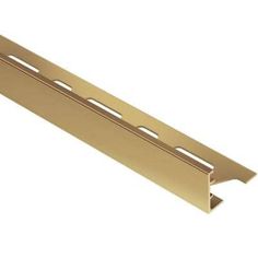 a gold metal strip on a white background