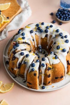 a bundt cake with blueberries and lemons