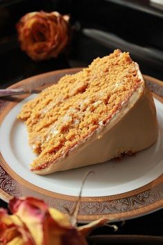 a piece of cake sitting on top of a plate next to a knife and fork