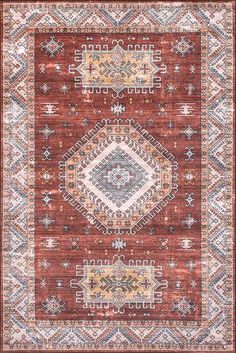 a red rug with an intricate design on the front and back side, in various colors