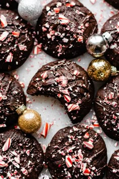 chocolate cookies with candy canes and christmas decorations