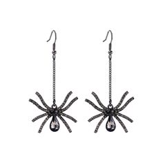 a pair of black and white spider earrings