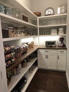 the pantry is stocked with lots of food