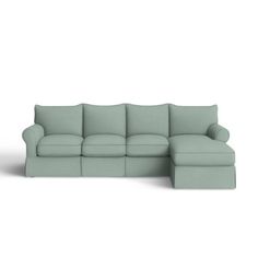 This large sectional seats up to five guests at a time, giving you space to sprawl out while anchoring your living room ensemble. Made in the USA, the frame is crafted from frame and it features brown-hued wood legs. The cushions are filled with down and supported by sinuous springs to help resist sagging over time, so this sofa is sure to last for years to come. Rolled arms, welt trim, and a tailored skirt complete this couch's traditional look, while solid-colored upholstery gives it the versa Green Sectional, Slipcovered Sectional, Large Sectional, Tailored Skirt, Sectional Slipcover, Livingroom Layout, Living Room Sectional, Birch Lane, Room Layout