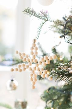 a christmas tree with ornaments hanging from it