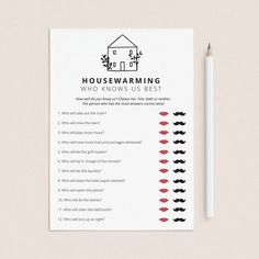 the housewarming question card is next to a pencil