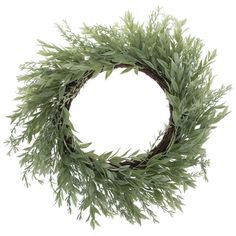 a round wreath with green leaves on a white background