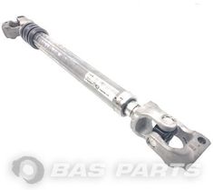 the front end of a vehicle with an axle and shock spring on it, against a white background