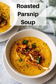 two bowls of roasted parsnip soup with garnishes on top