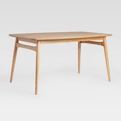 the table is made from wood and has two legs